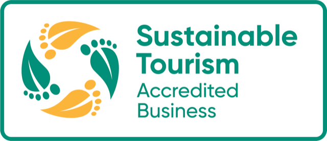 Wild Distillery - Logo for an Accredited Sustainable Tourism Business featuring green and yellow leaves and footprints in a circular pattern, with the text on the right. - Margaret River WA Wild distillery logo for an accredited sustainable tourism business featuring green and yellow leaves and footprints in a circular pattern, with the text on the right. margaret river wa