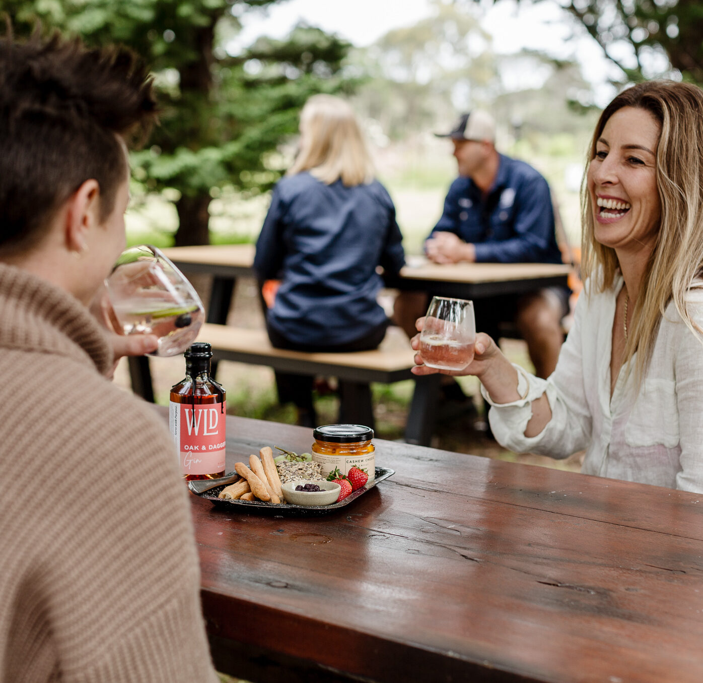 Wild Lot Distillery enjoying grazing board & sipping gin.